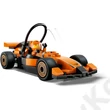 F1 pilóta McLaren versenyautóval